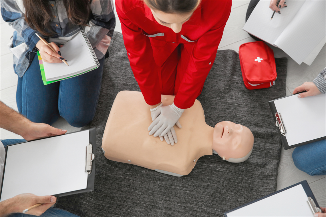 Photo of a person performing CPR