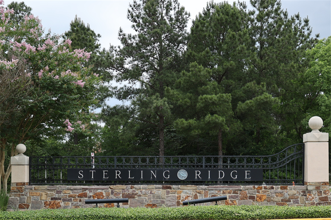 Photo of a brick village entrance sign for Sterling Ridge
