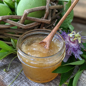 Maypop jam in a small mason jar