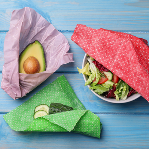 Various food items wrapped in beeswax wraps on a table