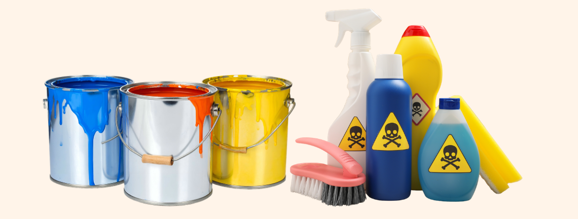 A collection of various paint buckets with different shaped bottles with the poison symbol on them