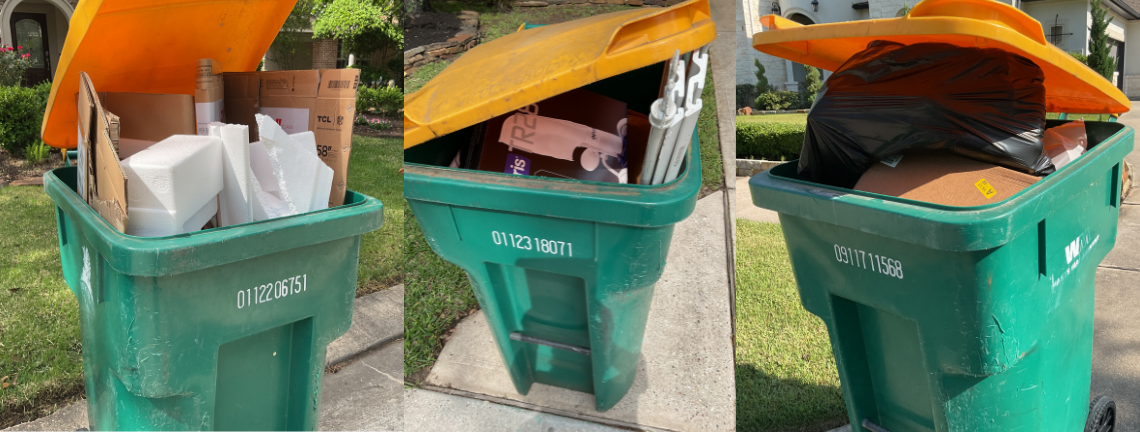 Three full recycling bins with materials spewing out with the lid unable to close