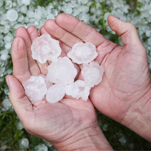 Hail in a persons hands