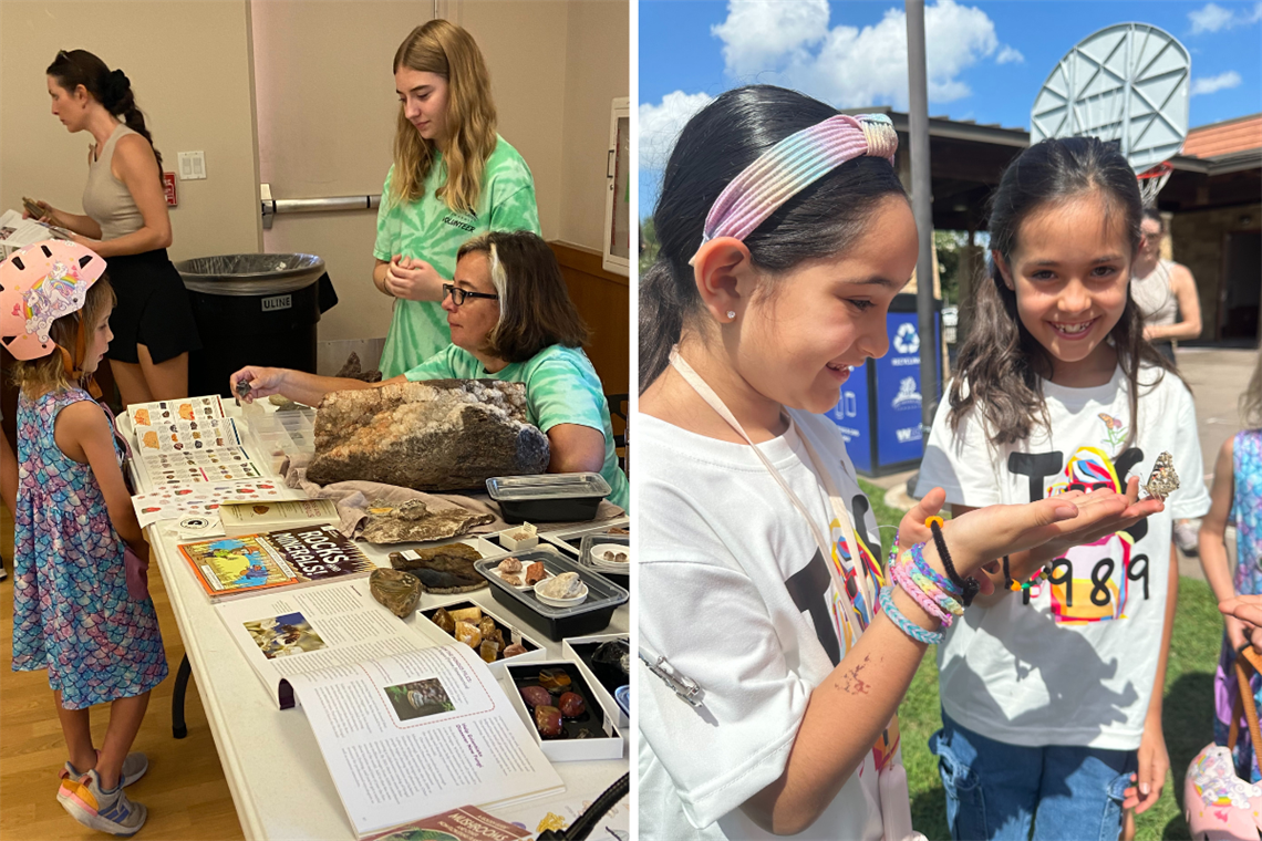 Photo of two smiling children looking at a butterfly