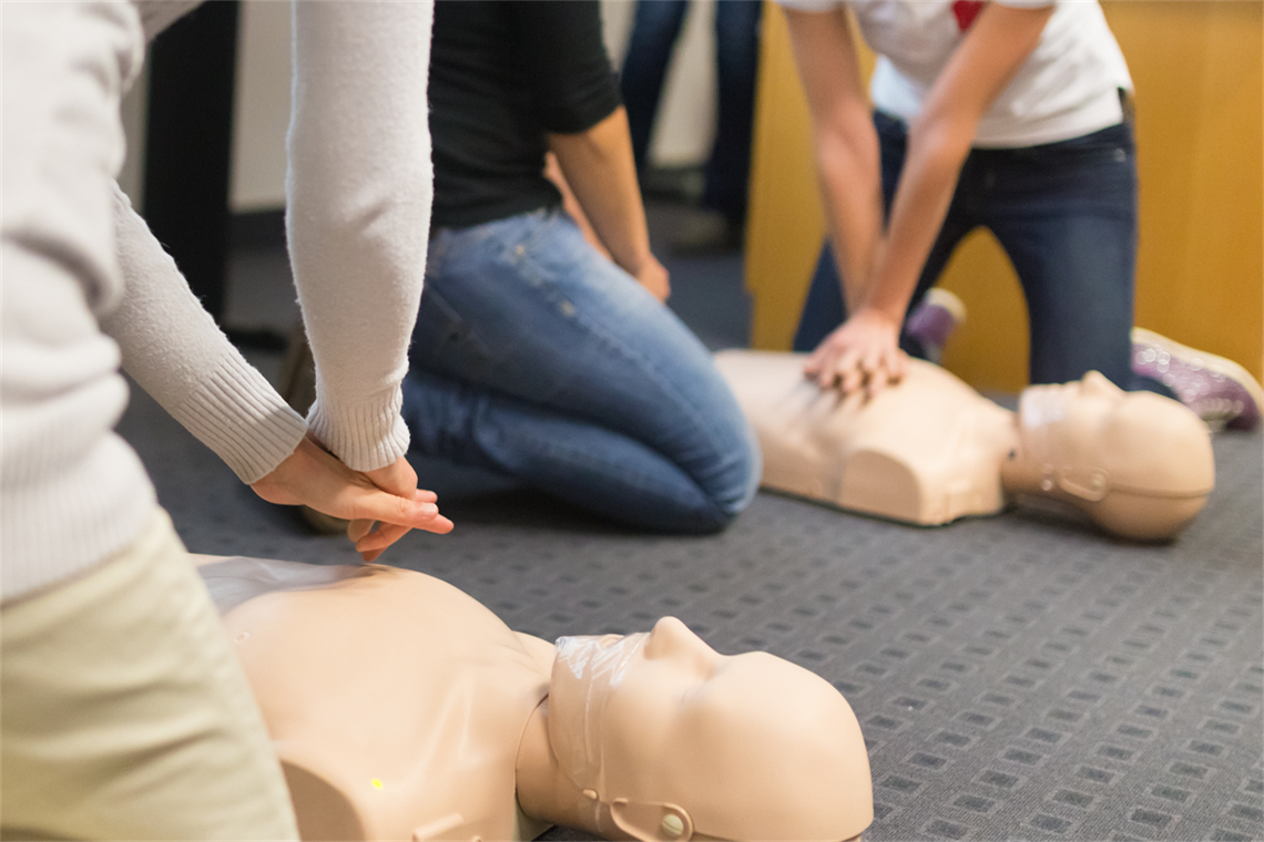 Photo of person teaching CPR 